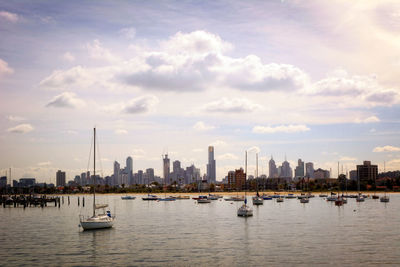 City skyline against cloudy sky