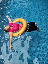 High angle view of woman in swimming pool