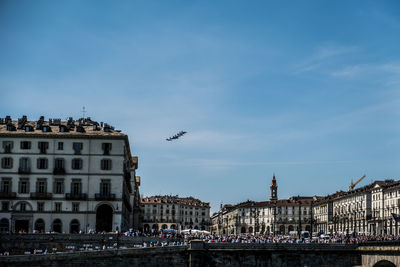 The italian tricolour arrows make a show in the sky of turin for the coronavirus on may 2020