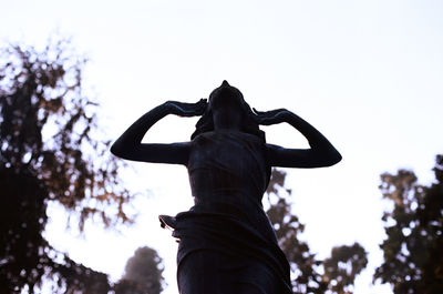 Low angle view of statue against clear sky