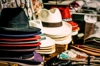 Stack of multi colored displayed for sale at market stall