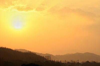 Scenic view of mountains at sunset