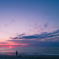 Scenic view of sea at sunset