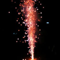 Firework display at night