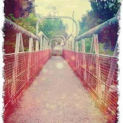 Footbridge with trees in background