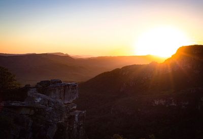 Scenic view of mountains against sky during sunset