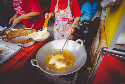 High angle view of people preparing food