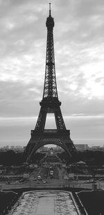 View of tower against cloudy sky