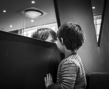 Boy standing at home