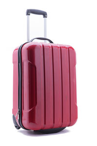 Close-up of red object over white background