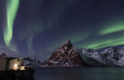 Scenic view of sea against sky at night