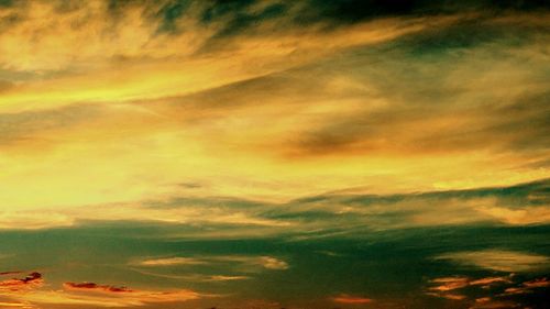 Low angle view of dramatic sky during sunset