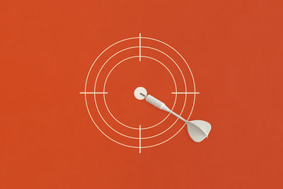 Directly above shot of heart shape on red background