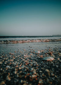 Scenic view of sea against clear sky