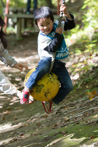 Full length of man holding bird