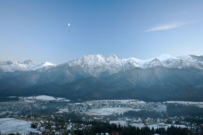 Scenic view of mountains against sky during winter