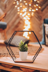 Close-up of tea light candles on table