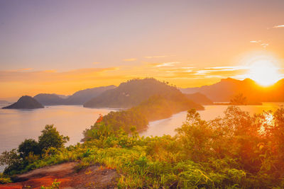 Scenic view of mountains against sky during sunset