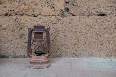 Old rusty pipe on wall