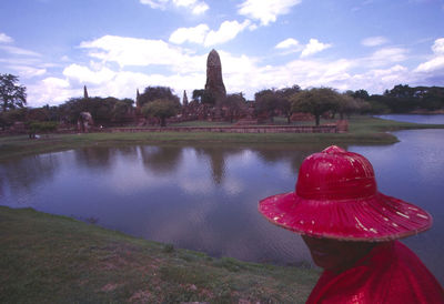 Red bell tower in a lake