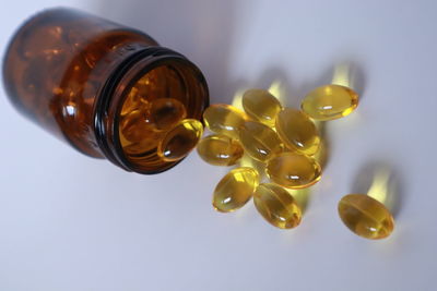 Close-up of bottles against white background