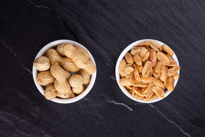 Directly above shot of breakfast on table against black background