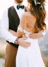 Young couple embracing outdoors