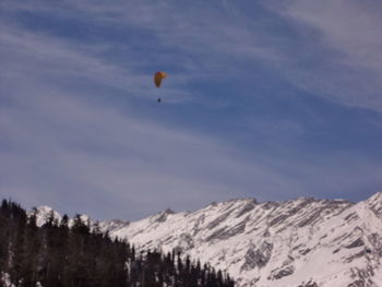 Scenic view of snow mountains against sky