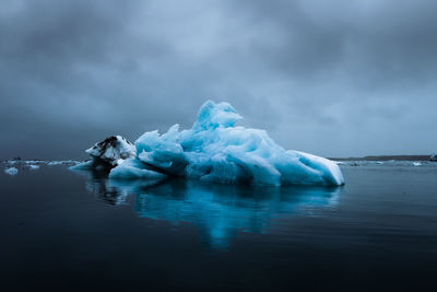 Scenic view of frozen sea against sky