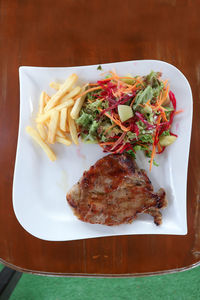 High angle view of food served on table