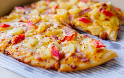 Close-up of pizza served on table