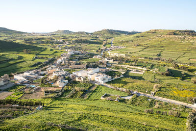 Aerial view of cityscape against clear sky