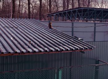 Metallic structure on roof of building