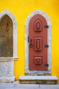 Close-up of yellow door of house