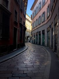 Street amidst residential buildings