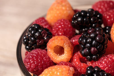 Close-up of raspberries in bowl on table