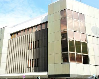 Low angle view of modern building against sky