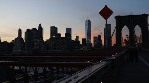 Modern buildings in city at sunset