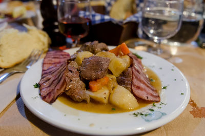 Close-up of food served on table