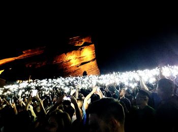 People enjoying at concert