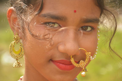 Close-up portrait of a smiling young woman