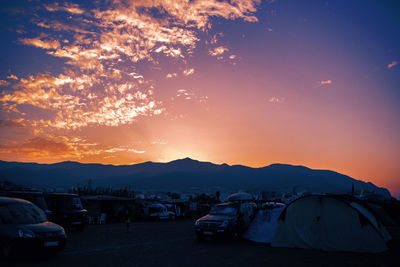 High angle view of tent against sky at sunset