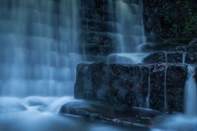Close-up of waterfall against fountain