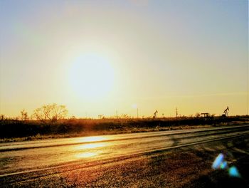 Scenic view of sunset against clear sky