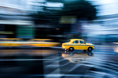 Blurred motion of car on city street