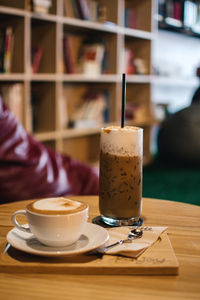 Coffee cup on table at cafe