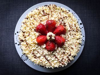 Directly above shot of strawberries in bowl on table