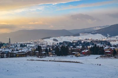 View of townscape against sky during winter