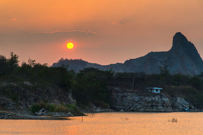 Scenic view of mountains at sunset