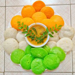 High angle view of fruits in bowl on floor